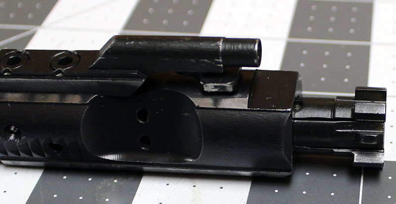 close-up on the bolt and gas piston